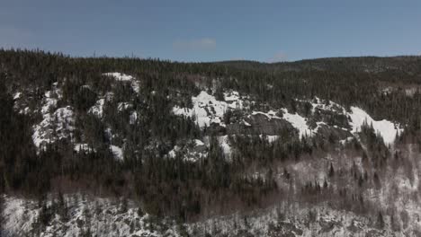Mountain-Ranges-With-Dense-Woodland-During-Winter-At-Mont-du-Dome-In-Quebec,-Canada