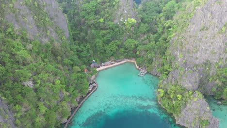 Aerial-view-of-beautiful-karst-scenery-and-turquoise-waters-around-Coron,-Palawan,-Philippines