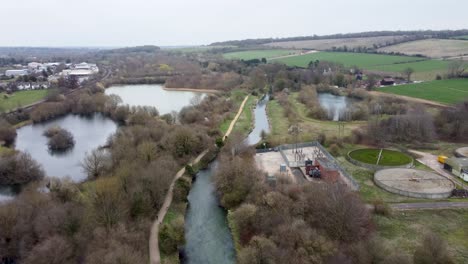 A-drone-shot-following-the-Stour-River-in-Chartham,-England
