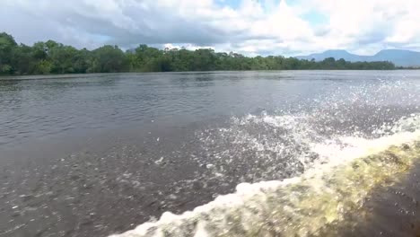 Slow-motion-video-of-a-canoe-wake-in-the-Carrao-River,-in-Canaima,-Venezuela