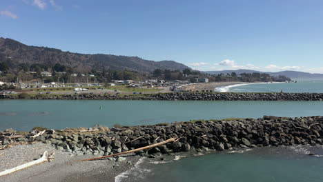 Drone-Flying-Low-Over-Jetties-In-Brookings,-Oregon-At-Daytime---aerial-drone-shot