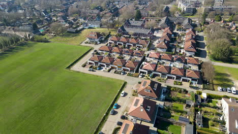 Aerial-of-beautiful-houses-in-green-suburban-neighborhood