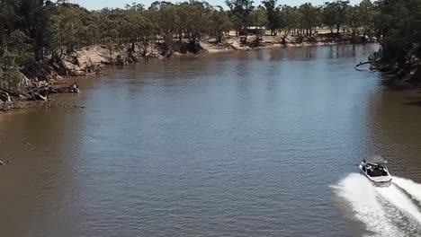 Outdoor-nature-drone-aerial-over-muddy-Australian-river-camping