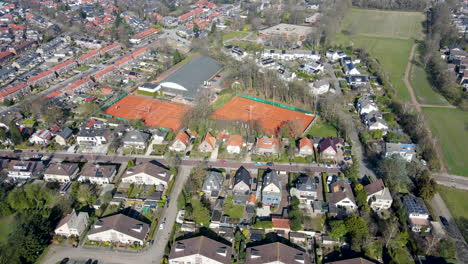 Aerial-of-tennis-court-in-small-town