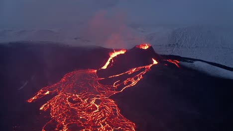 River-of-hot-lava-flowing-from-an-erupting-Fagradalsfjall-Volcano-in-South-Iceland--aerial