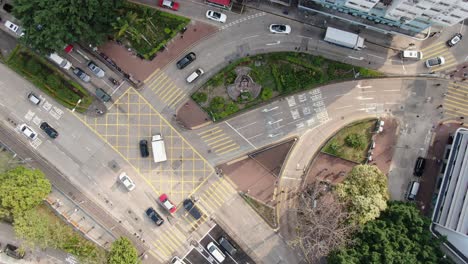 Hong-Kong-daytime-city-traffic,-Top-down-aerial-view
