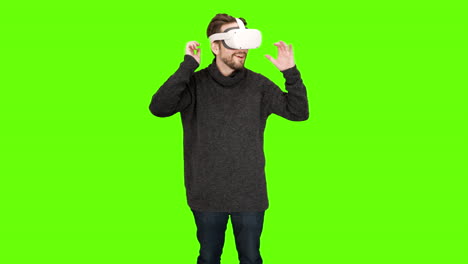 Young-man-puts-on-white-VR-headset-mixed-reality-augmented-reality-ar-vr-xr-exploring-futuristic-communication-look-around-virtual-world-immersive-experience-comfortable-player-hp-reverb-g2-windows-3d