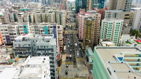 Gebäude-In-Der-Innenstadt-Von-Hongkong,-Zebrastreifen-Und-Verkehr,-Luftbild-Aus-Großer-Höhe