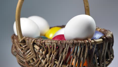 Colored-eggs-rotate-in-a-basket