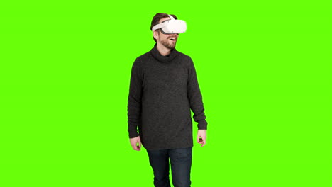 Man-experience-amazing-immersive-VR-content-in-oculus-virtual-reality-headset-first-time-impressed-experience-real-world-quest-goggles-game-look-around-vacation-green-screen-mixed-reality-alternative