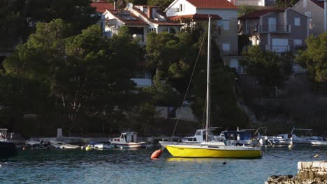 Beautiful-yellow-fishing-boat-moored-at-Primosten-harbour-in-Croatia