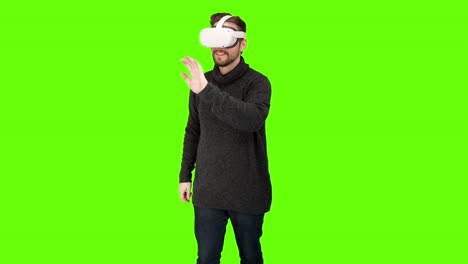 Casual-VR-virtual-reality-mixed-augmented-headset-touching-scrolling-tv-shows-swiping-around-green-screen-motion-capture-ar-xr-experience-technology-daydreaming-shopping-products-e-commerce-immersive