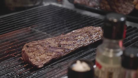 Big-venison-meat-slice-grilled-on-grill-tray