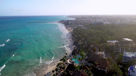 Cinematic-drone-shot-of-Playa-Del-Carmen-coastline-and-resorts