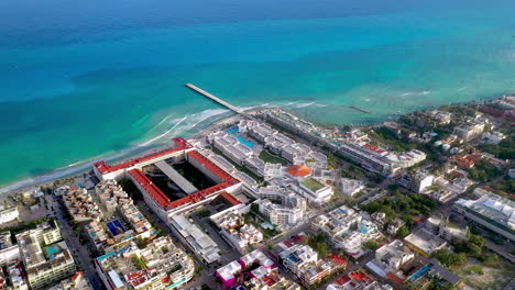 Cinematic-drone-shot-of-resorts-on-the-coastline-of-Playa-Del-Carmen-Mexico