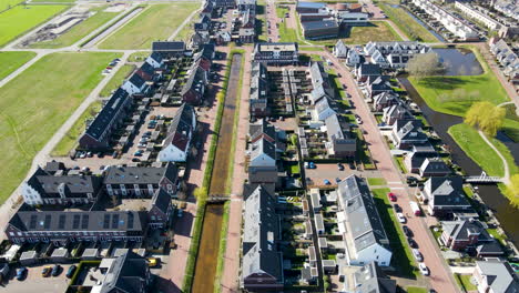 Aerial-of-beautiful-suburban-neighborhood-with-solar-panels-on-rooftop