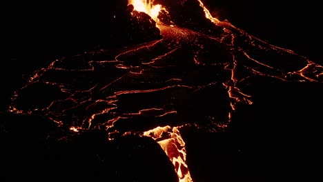Viscous-flow-of-lava-at-effusive-volcano-mound-of-Geldingadalsgos-at-night