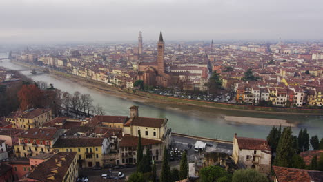 Verona,-Italy-on-a-cloudy-day-seen-from-Castel-San-Pietro,-wide-shot-zoom-in
