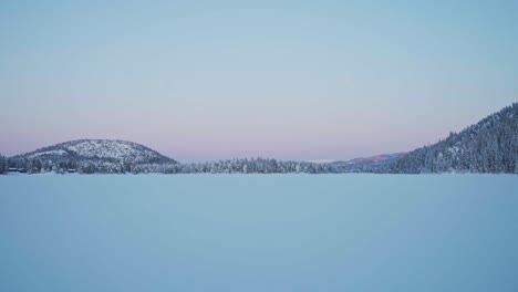 Beautiful-Foggy-Winter-Landscape-In-The-Norwegian-Mountains---medium-shot,-pullback