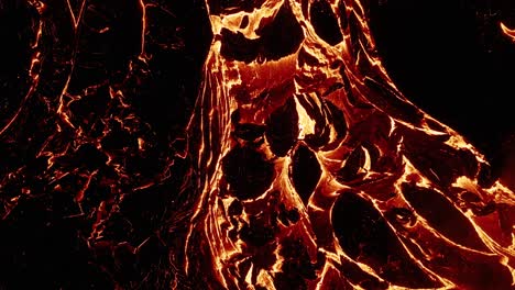 Natural-scene-of-new-land-forming-at-night,-lava-flow-on-earths-mantle