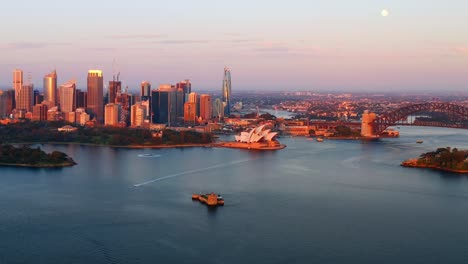 Distant-Aerial-View-of-Sydney-Harbour-with-Opera-House-in-the-Center-during-Sunrise,-NSW-Australia