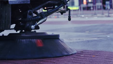 Close-up-of-a-street-sweeper-in-movement
