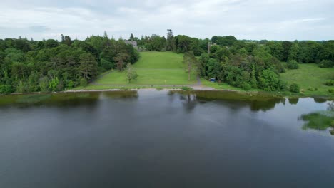 Aerial-view-of-Belvedere-House,-shot-from-above-Lough-Ennell