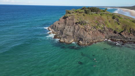 Bird's-Eye-View-Of-Norries-Headland-With-Rocky-Cliff---Surfing-At-Cabarita-Beach-IN-NSW,-Australia