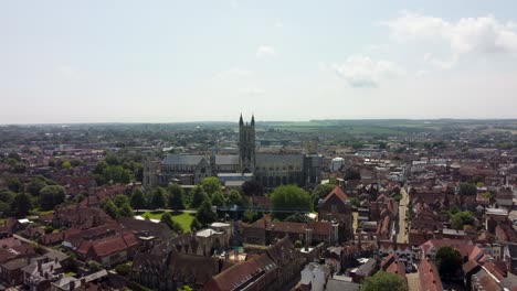 4K-drone-video-moving-towards-the-Canterbury-Cathedral-with-orange-rooftops
