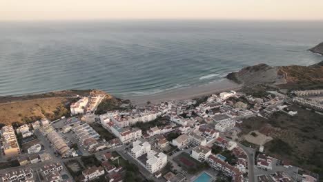 Quiet-Burgau-beach-in-Portugal-without-people-during-golden-hour