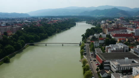 Studenska-Footbridge-Over-The-Drava-River-And-The-Cityscape-Of-Maribor-In-Slovenia