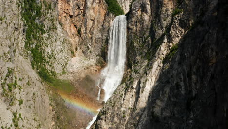Aerial-View-Of-Boka-Waterfall-With-Beautiful-Rainbow-On-A-Sunny-Day-In-Slovenia