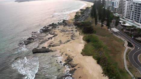 Aerial-View-Of-Mooloolaba-Beach-With-Rocky-Coast-At-Sunrise-In-Sunshine-Coast,-QLD,-Australia