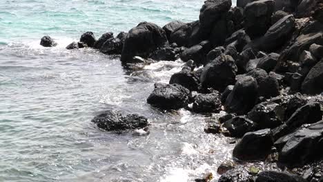 The-ocean-waves-breaking-on-the-rocks-along-the-seashore