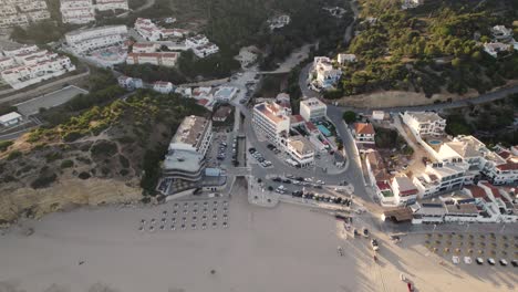 Birds-eye-view-of-the-beachfront-in-Salema,-Portugal