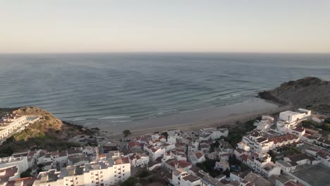 Golden-hour-at-Burgau-beach-in-Portugal-with-holiday-stays-closeby