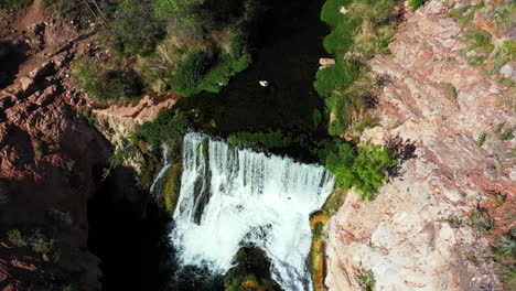 Aerial-View,-Waterfall-at-Fossil-Springs-Hiking-Trail-on-Sunny-Day,-Arizona-USA