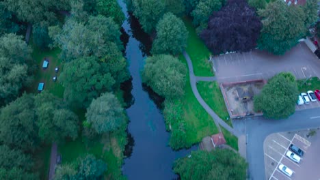 Aerial-Drone-Footage-Following-and-Looking-Down-at-Little-Ouse-River-in-Norfolk,-England