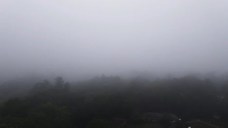 Aerial-drone-footage-of-a-foggy-morning