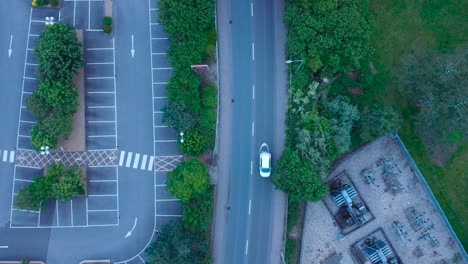 4K-Aerial-Drone-Footage-Looking-Directly-Down-at-Main-Road-in-Thetford-with-Moving-Traffic,-Norfolk,-England