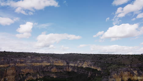 River-Meander-Among-Cliffs-In-Hoces-del-Rio-Duraton-Natural-Park-With-Hermitage-Of-Convent-de-la-Hoz-In-Sebulcor,-Segovia,-Spain