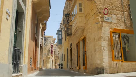 Stone-color-orange-narrow-street-alley-in-local-neighborhood-with-traditional-architecture