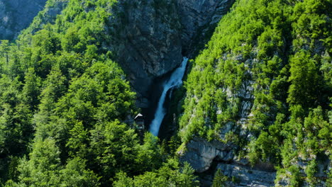 Popular-Savica-Waterfall-Surrounded-With-Green-Forest-At-The-Cliff-In-Triglav-National-Park-In-Slovenia