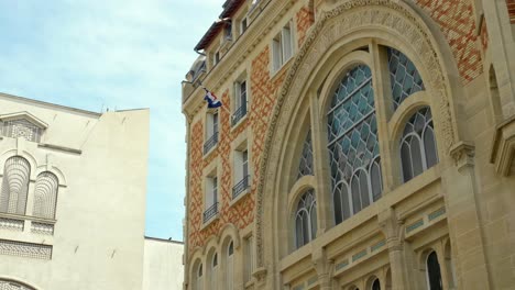 Beautiful-Facade-Of-Embassy-Of-Costa-Rica-In-Rapp-Square,-7th-Arrondissement-Of-Paris-In-France-With-French-Flag-On-Exterior