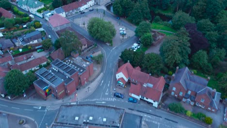 4K-Aerial-Drone-Footage-Over-Thetford-with-Covid-19-Vaccination-Centre-in-Car-Park-Fly-By-in-Thetford,-Norfolk,-England