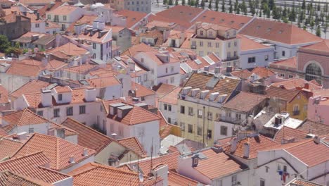 A-Zoomed-In-Panning-Shot-of-Lisbon's-Rooftops-in-Alfama-District