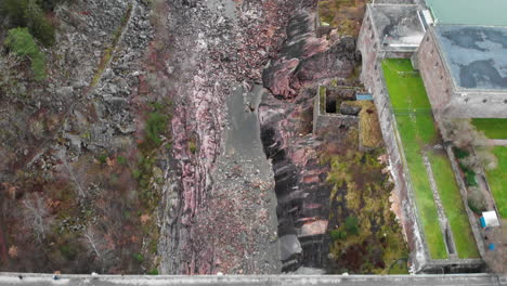 Aerial-View-Of-Trollhattan-Waterfalls-In-Trollhattan,-Sweden-With-Oscarsbron-Bridge-Revealed