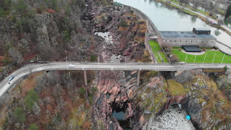 Aerial-Shot-Of-Trollhattan-Waterfalls,-Dam-Wall-And-Surrounding-Power-Plant-In-Sweden