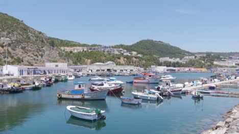A-Panning-Shot-of-a-Harbour-full-of-Fishing-Boats-in-a-sleepy-Portuguese-town-Sesimbra