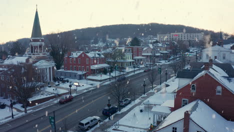Winter-snow-falls-on-quaint-cozy-America-town